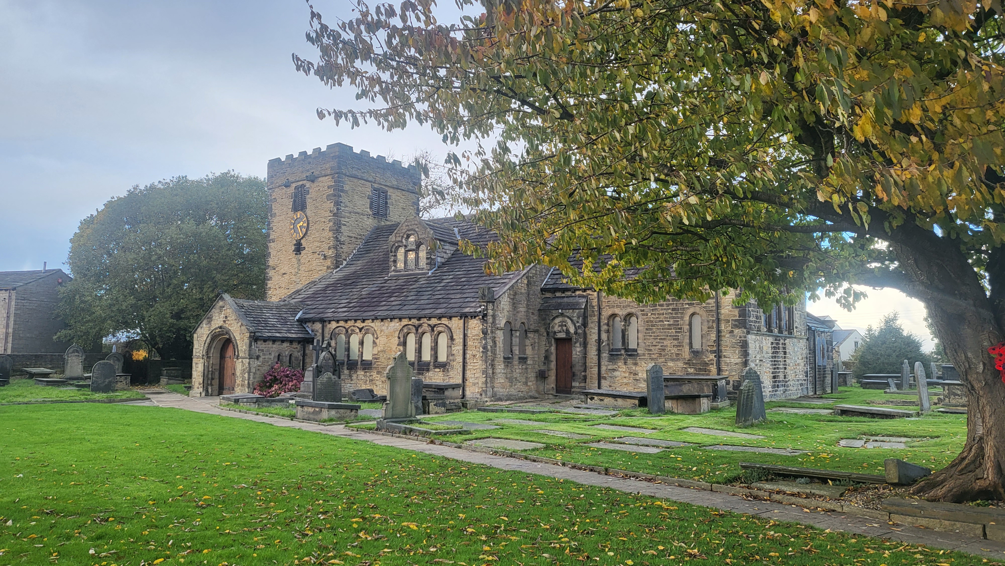 Hartshead church with tree in churchyard